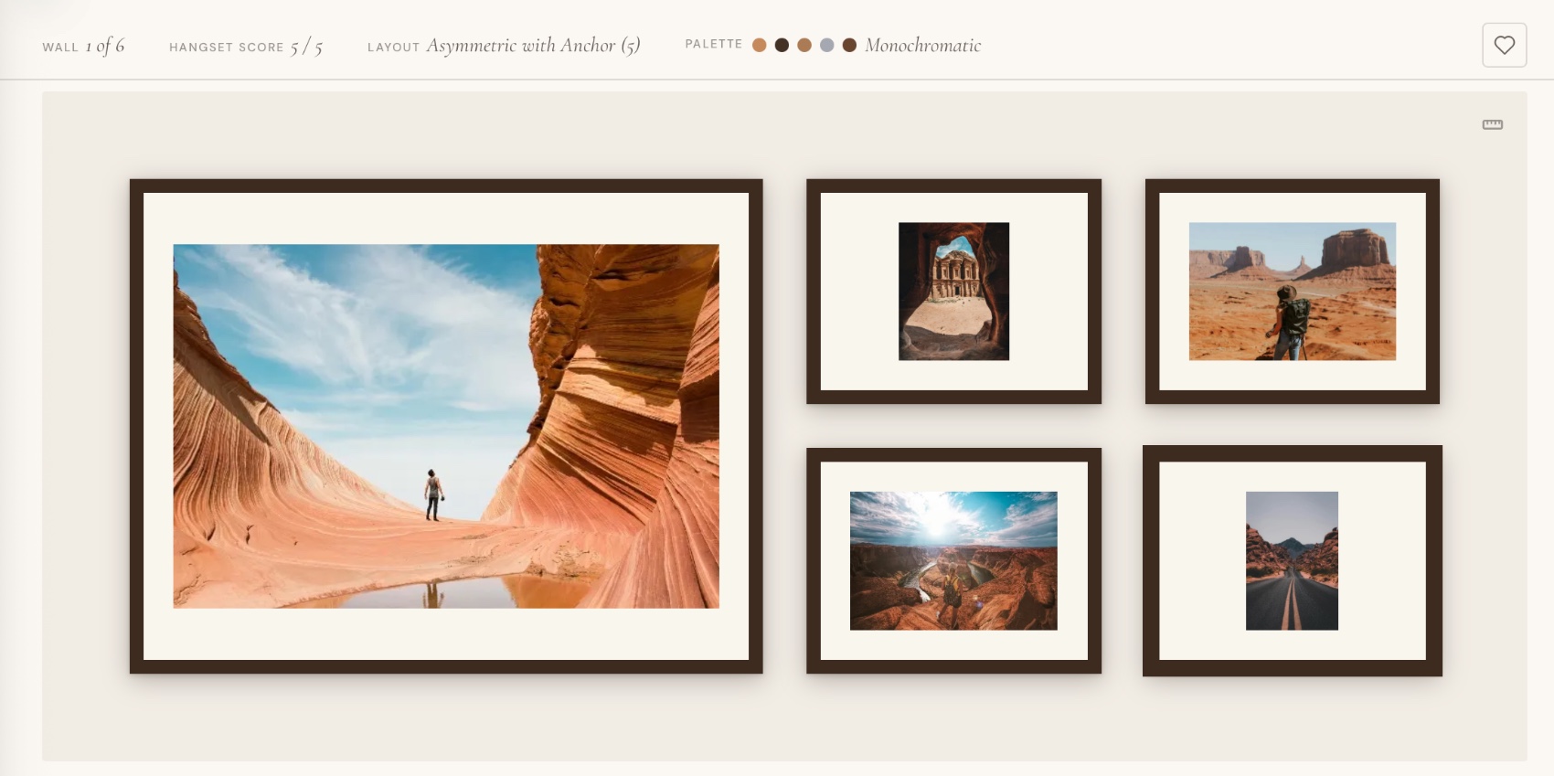 A recommended gallery wall — an asymmetric desert arrangement with a large anchor and four supporting prints in walnut frames.